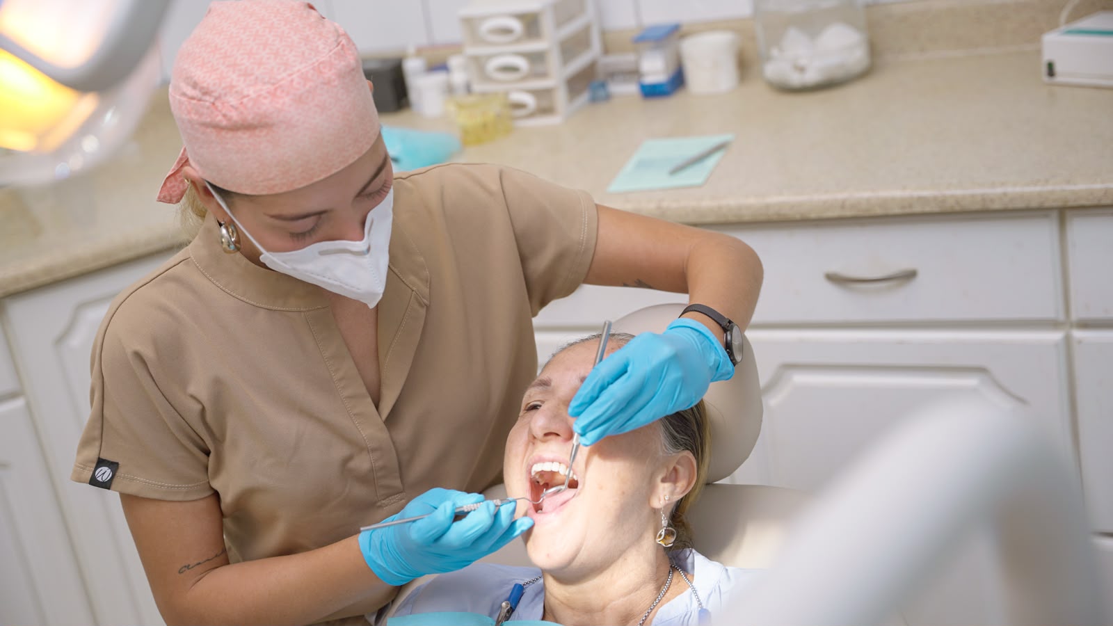 Dentist performing a teeth cleaning at Manuel Antonio Dentistry